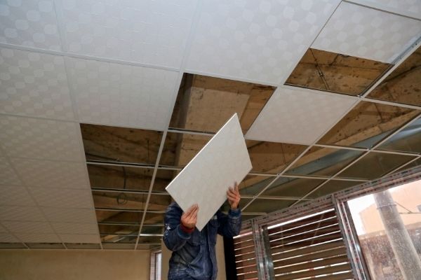 Drop ceiling installation for interior spaces